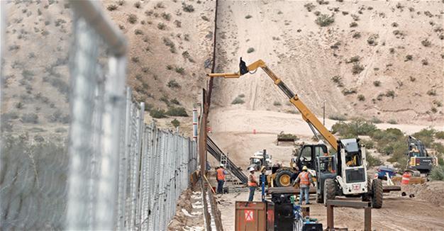 Mexico vows to impose tariffs if Trump presses wall payment