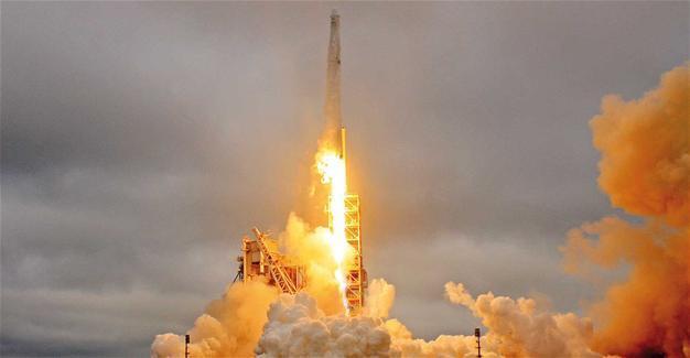 SpaceX to send first paying tourists around moon next year