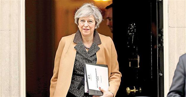 Parliament backs Brexit bill, May says divorce ‘in coming days’