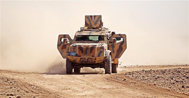 US-led coalition air drops Syrian rebel forces in Raqqa province