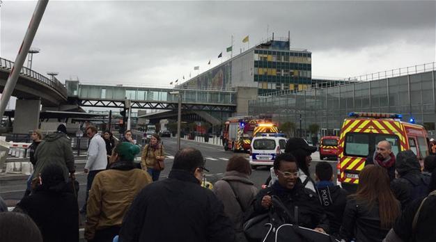 Flights resume at Paris airport as attacker’s family under interrogation