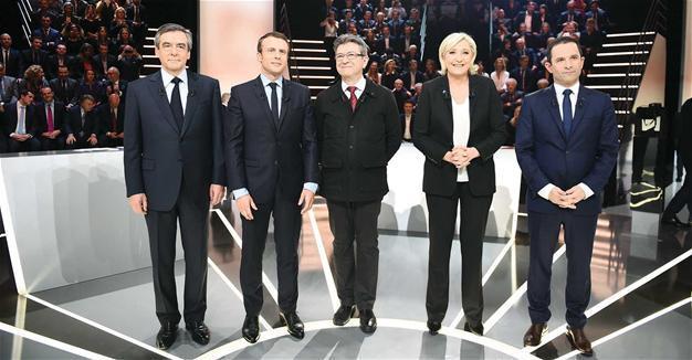 Macron seen winning French TV debate, clashes with Le Pen