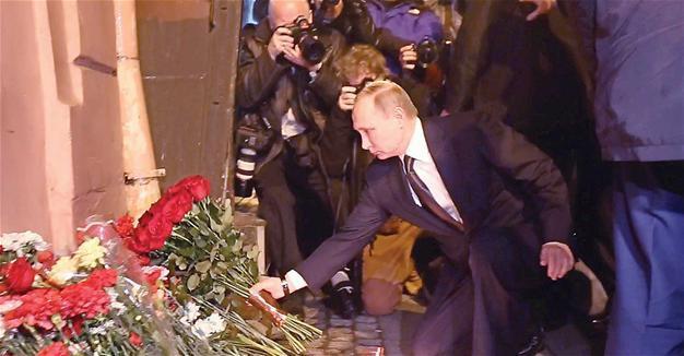 Russia raises death toll in metro bombing to 14