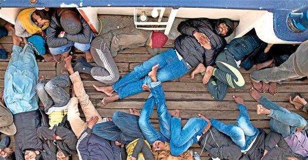 At least 97 migrants missing as boat sinks off Libya