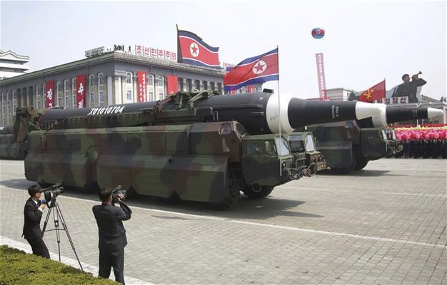 North Korea flaunts long-range missiles in massive parade