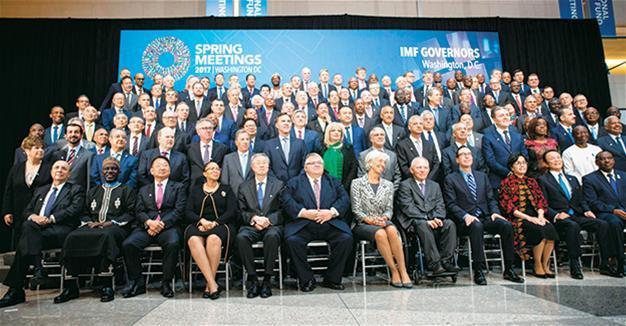 IMF warns against protectionism, but strikes word from statement