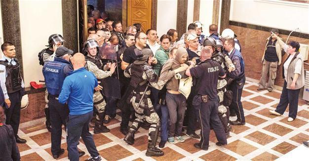 Macedonia parliament violence injures 100