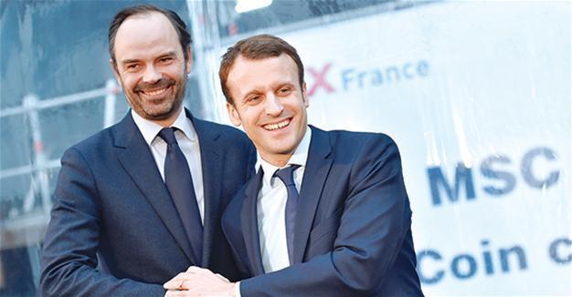 France’s Macron appoints center-right PM to widen appeal