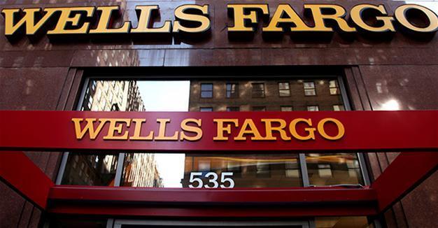 Pay slashed for eight top Wells Fargo execs after scandal
