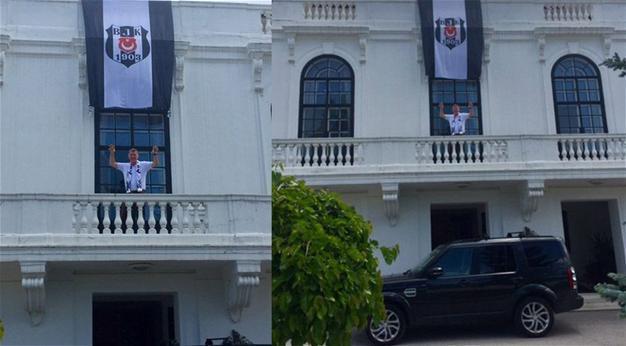 Beşiktaş fan and British envoy to Turkey drapes flag over embassy to celebrate league title