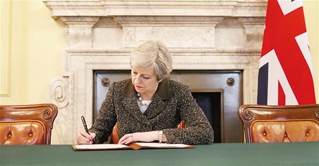 UK Prime Minister May triggers ‘historic’ Brexit with letter to EU