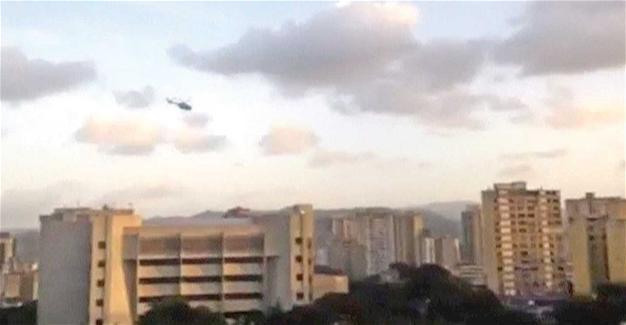 Helicopter attacks Venezuela court, Maduro denounces coup bid