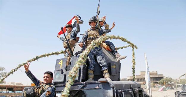Iraqi military says it has retaken two Mosul neighborhoods from ISIL
