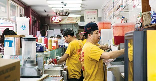 US job growth accelerates in June, but wages continue to lag