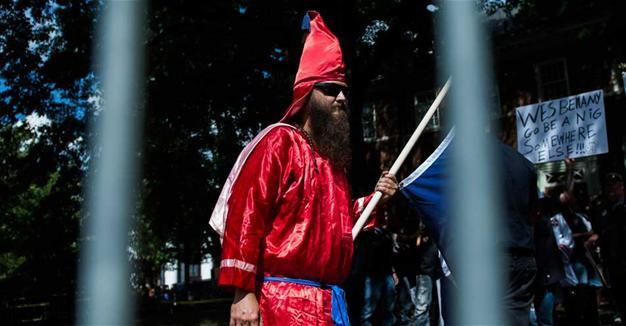 KKK marchers in Virginia town met by throngs of counter-protesters