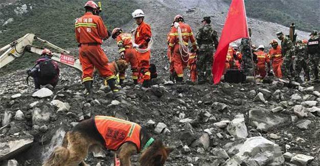 Hopes fade for 100 missing landslide victims in China