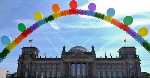 Germany legalizes same-sex marriage, Merkel votes against