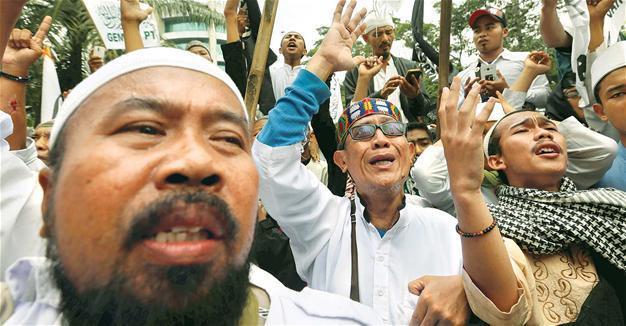 Jakarta’s governor jailed for 2 years for blasphemy