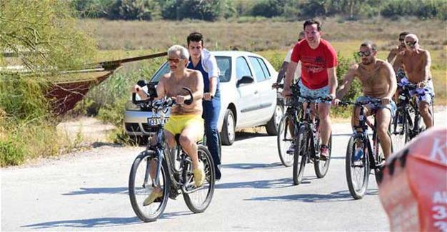Saudi Prince rides bicycle on streets of Turkish resort Bodrum during holiday