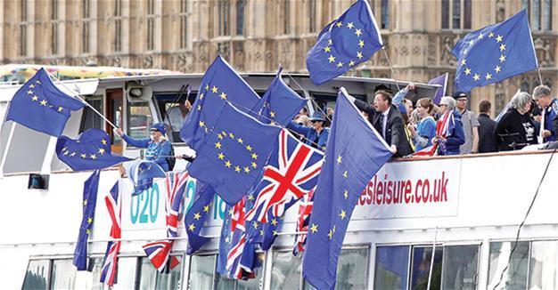 UK warns European Union not to ‘drag its feet’ on Brexit