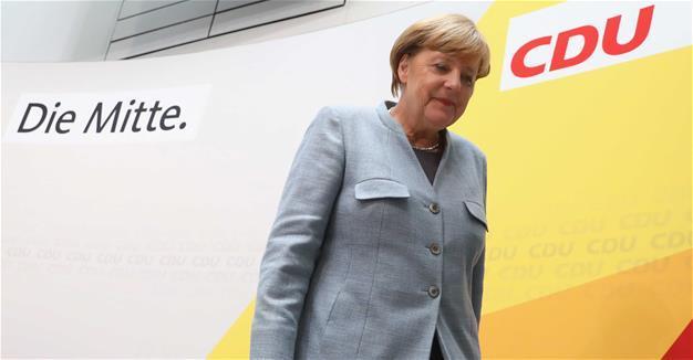 Chastened Merkel braces for coalition tussle after vote