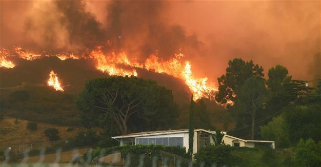Los Angeles turns corner on largest wildfire in city history