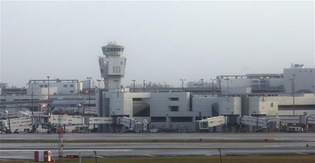 Empty runways and gates are see at Miami International Airport.