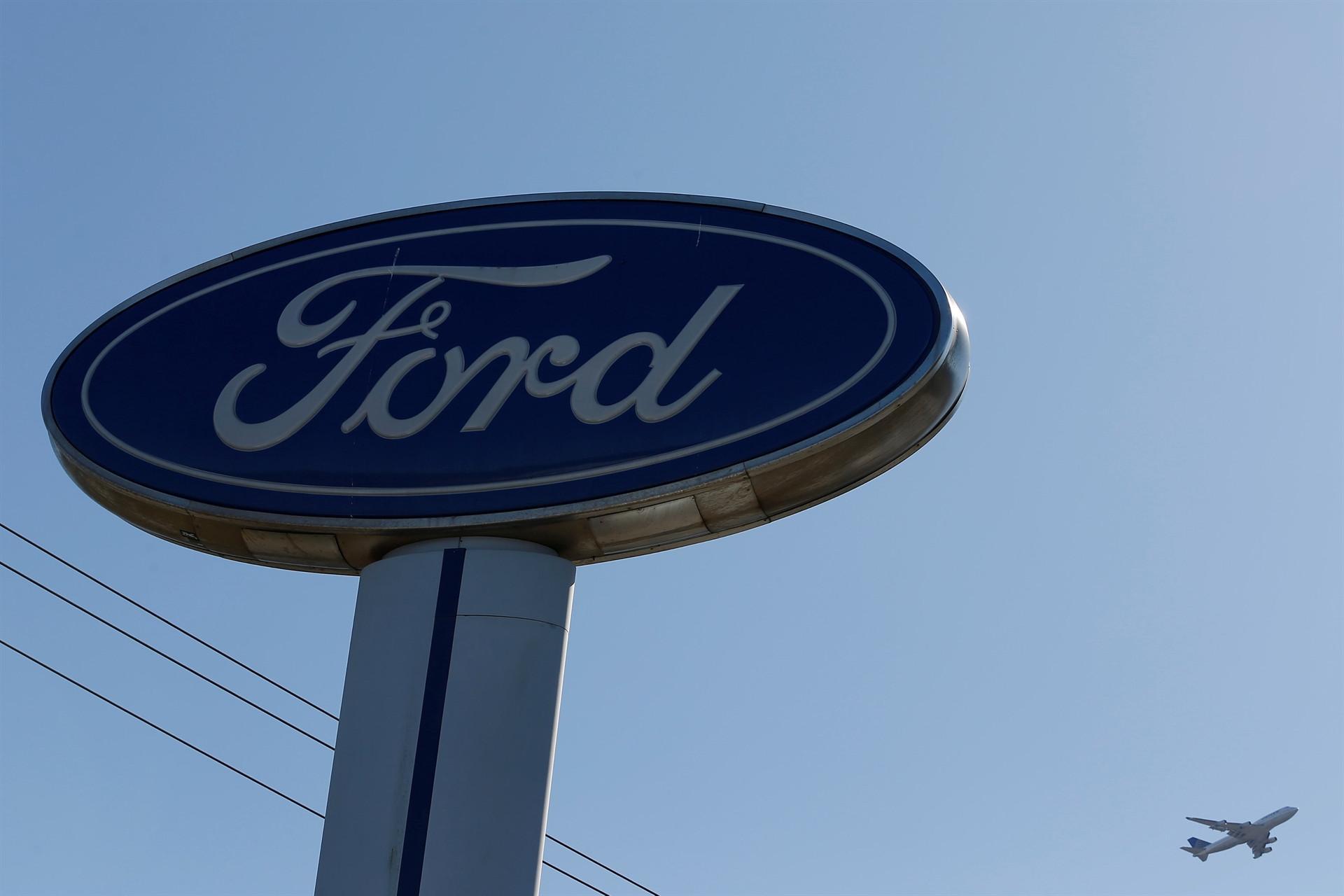 Ford to cut costs $14 bln, invest in trucks, electric cars: CEO