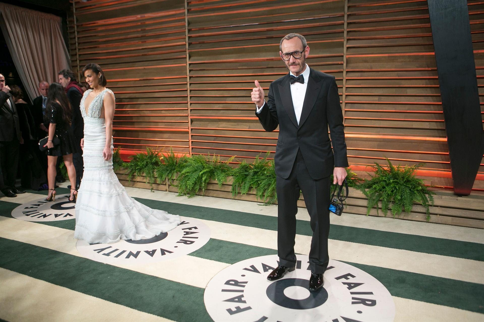 Conde Nast drops fashion photographer over exploitation claims