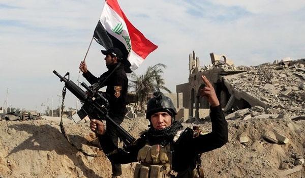 Iraqi PM raises flag in border area taken from ISIL