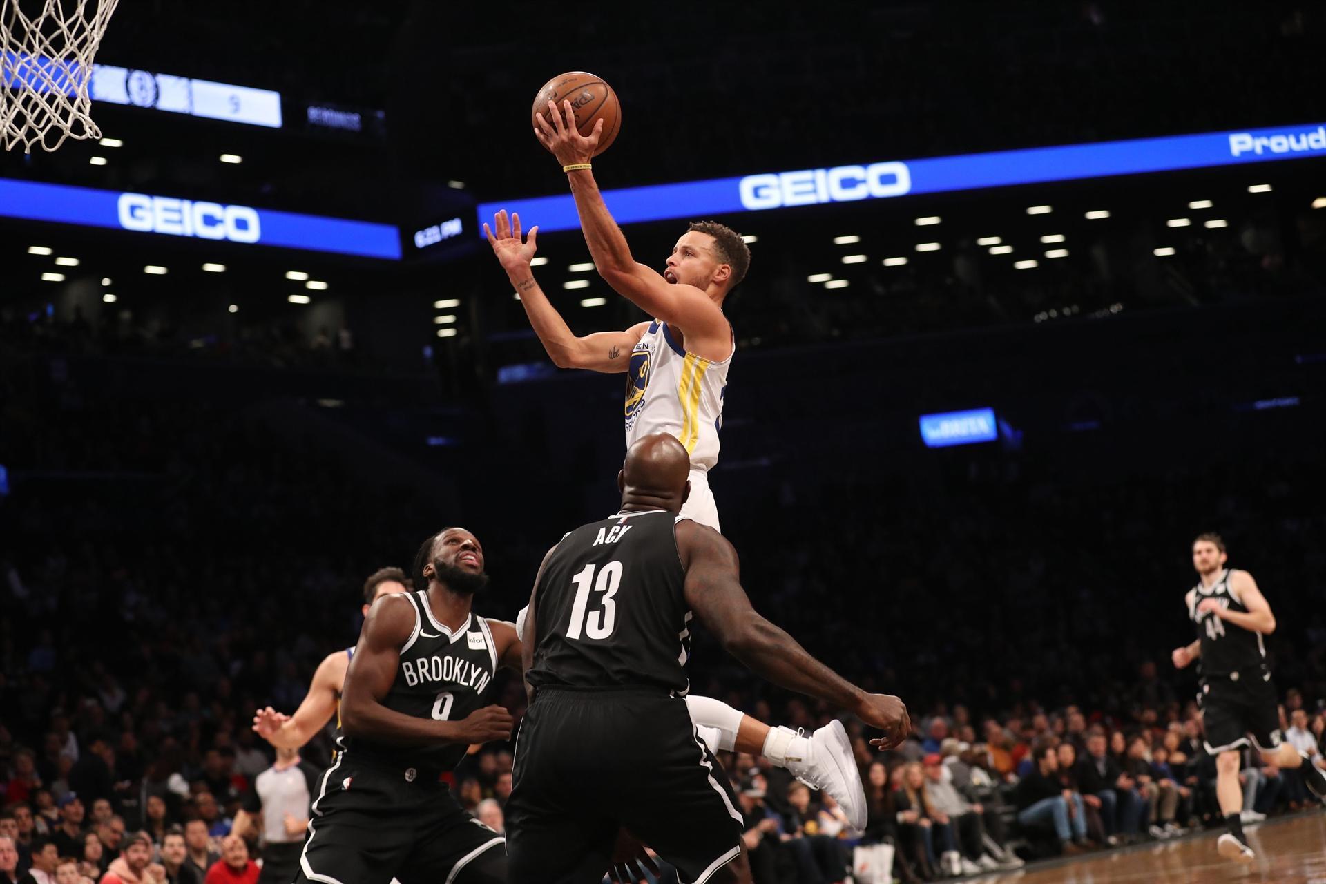 Curry scores 39 to power Durant-less Warriors over Nets