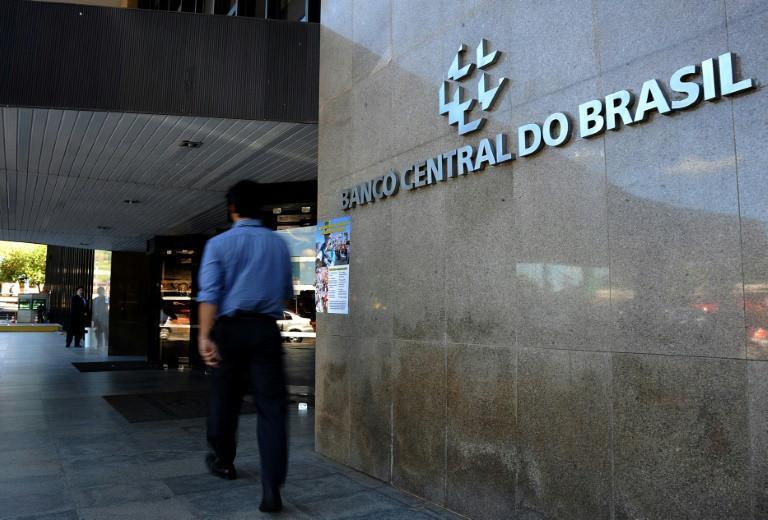 Brazil cuts interest rate to record low seven percent