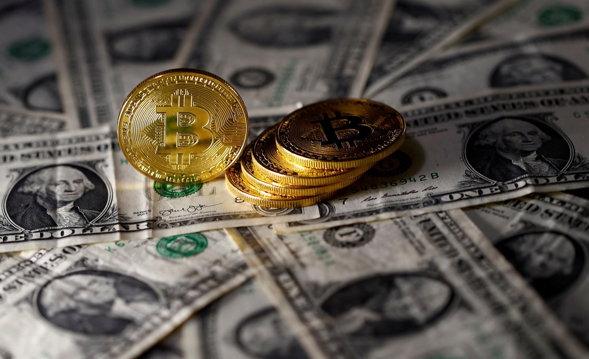 Bitcoin plunges 15 pct in wild trading