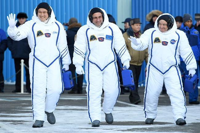 Two rookie astronauts, cosmonaut blast off to International Space Station