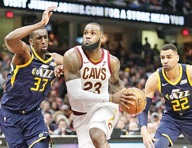 James’ triple-double lifts Cavs over Jazz