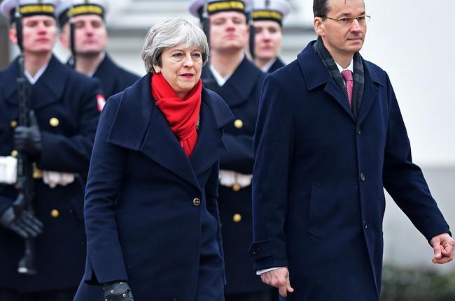 UK compromises on Brexit date as EU sets out transition