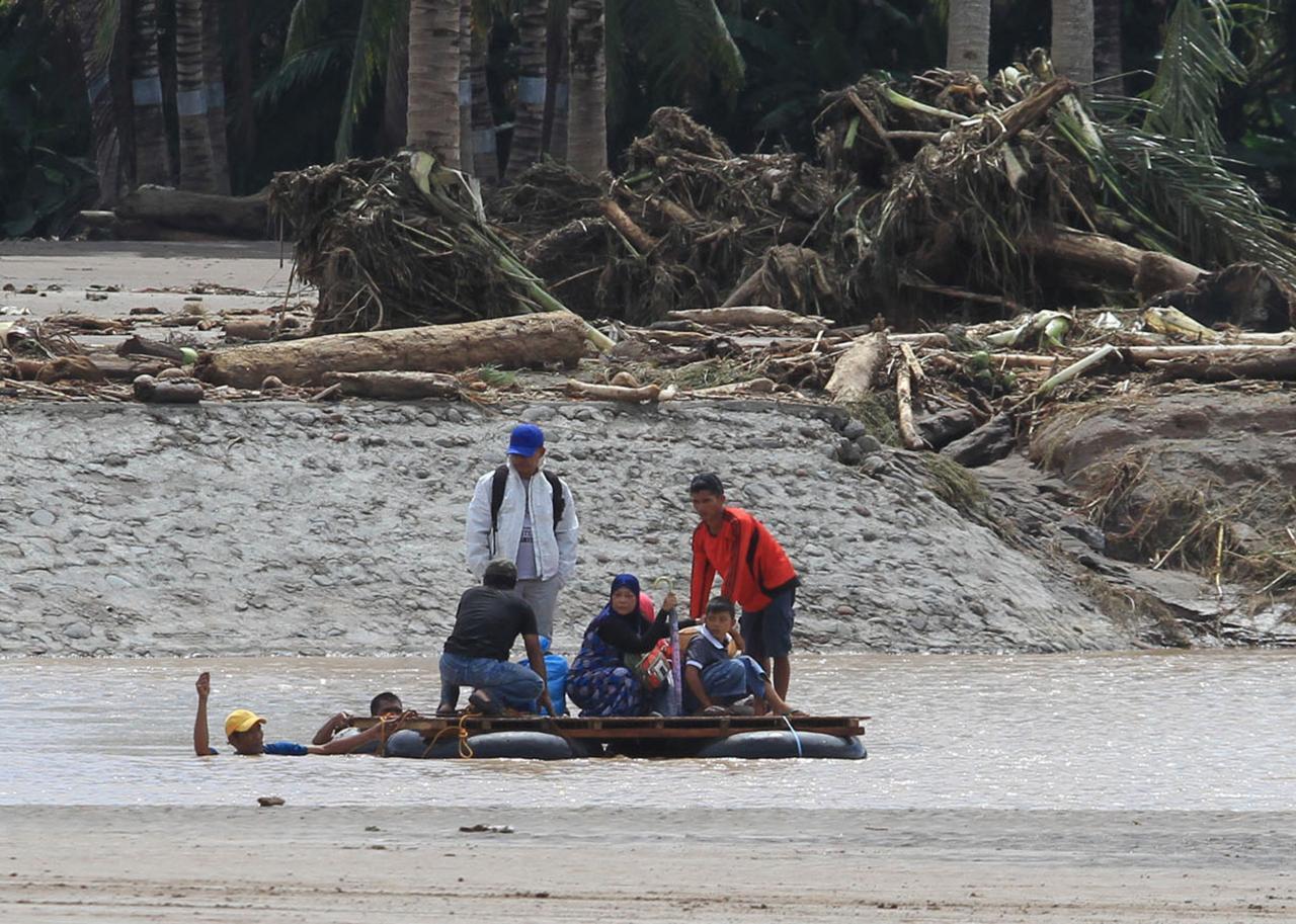 Rescuers search for Philippine storm victims as toll rises to 200