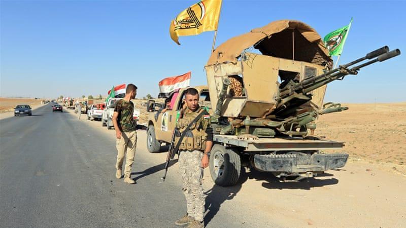 Iraqi Shiite paramilitaries deploy to Syrian border