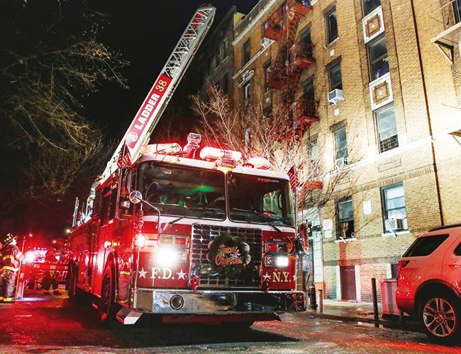 New York City fire kills 12, sends residents scrambling