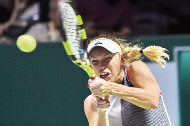 Wozniacki continues march in Auckland