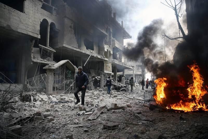 Syrian army breaks siege of army base near Damascus