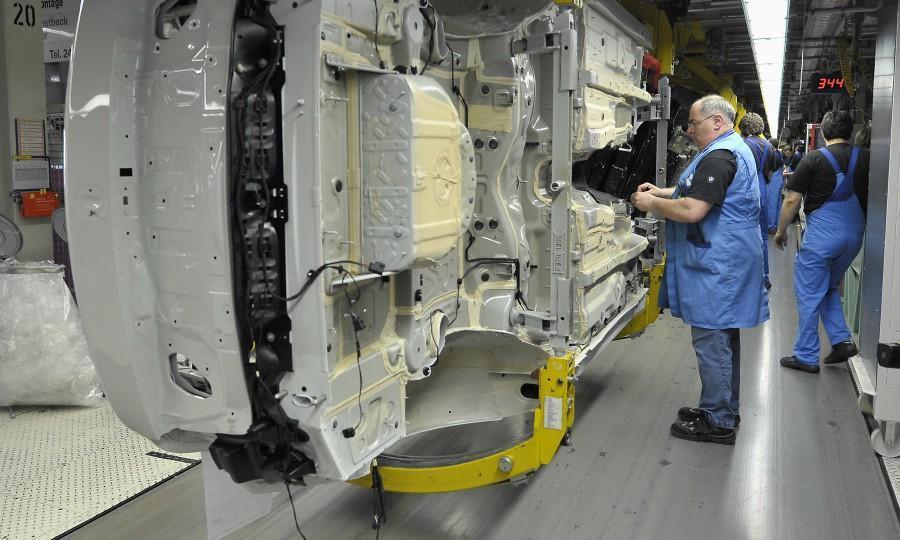Audi, BMW workers stage strikes amid talks over wages, hours