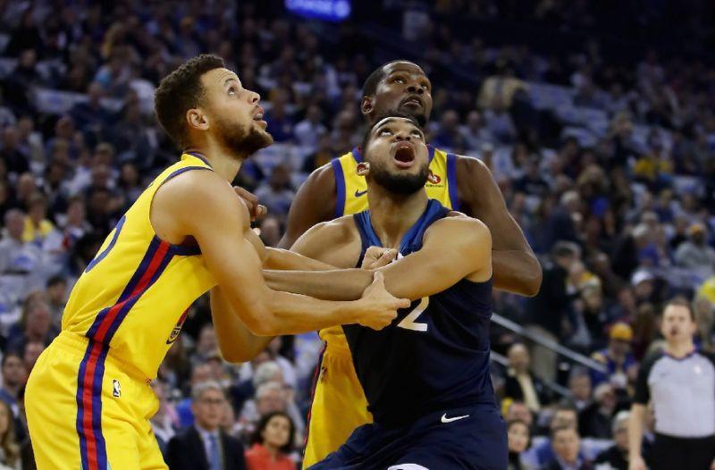 Durant triple as Warriors tame Timberwolves