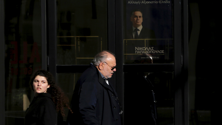 Old guard against new blood in Greek Cyprus presidential vote