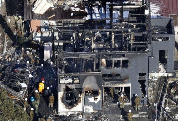 Authorities find body part after chopper crash in Japan