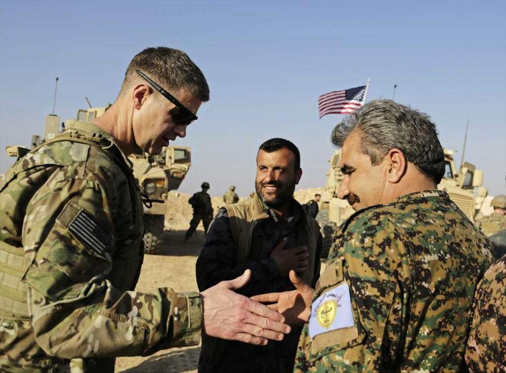 US general says troops will remain in Manbij, backs Kurdish group