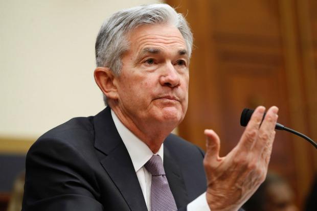 Dollar builds on 3-week high after Powell testimony
