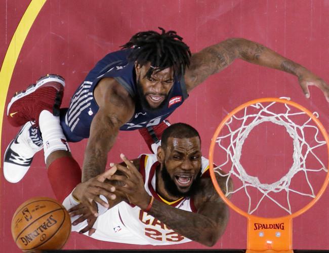 James, Nance power Cavs past Pistons