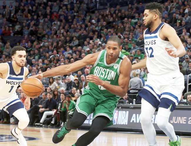 Celtics book playoff berth, Warriors rally
