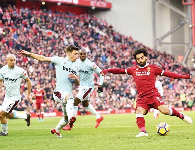 Manchester bids to keep Liverpool at bay